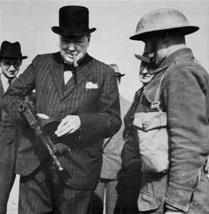 Winston Churchill with a Tommy Gun during an inspection near Harlepool, 1940